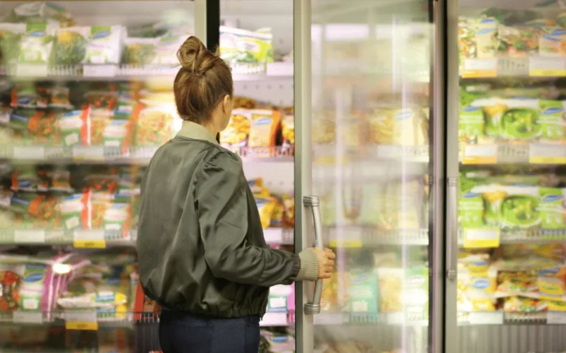 Plate comparison showing whole foods versus ultra-processed packaged items