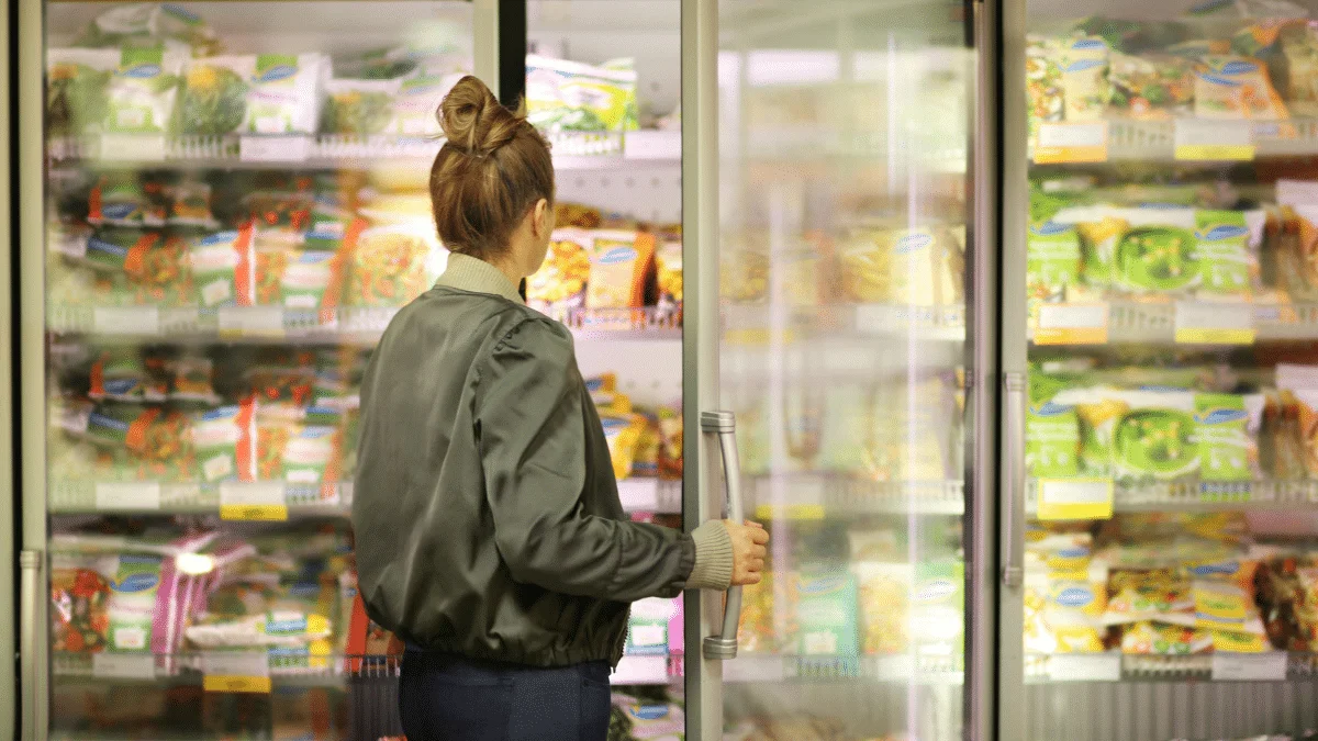 Plate comparison showing whole foods versus ultra-processed packaged items