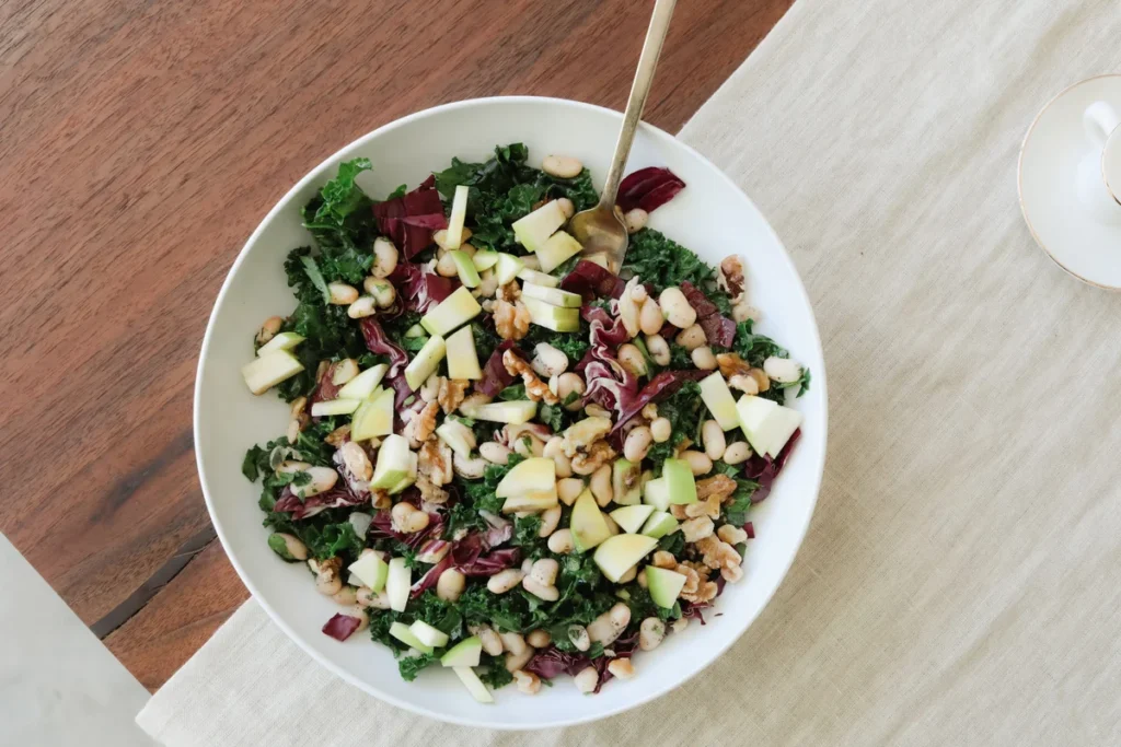 Colorful salad bowl with fresh vegetables and grains