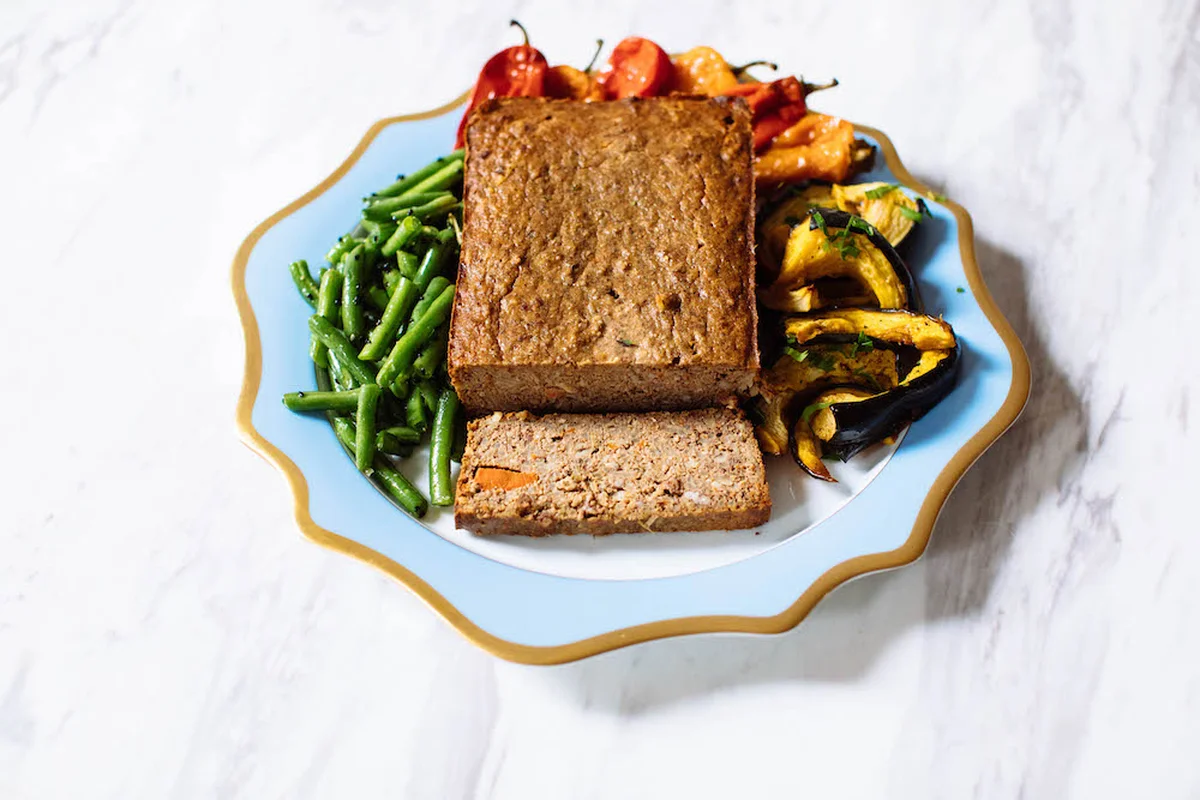 Vegetarian nut loaf sliced for holiday dinner
