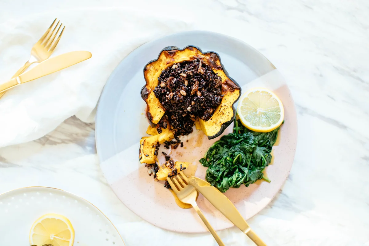 Black rice stuffed acorn squash bowl
