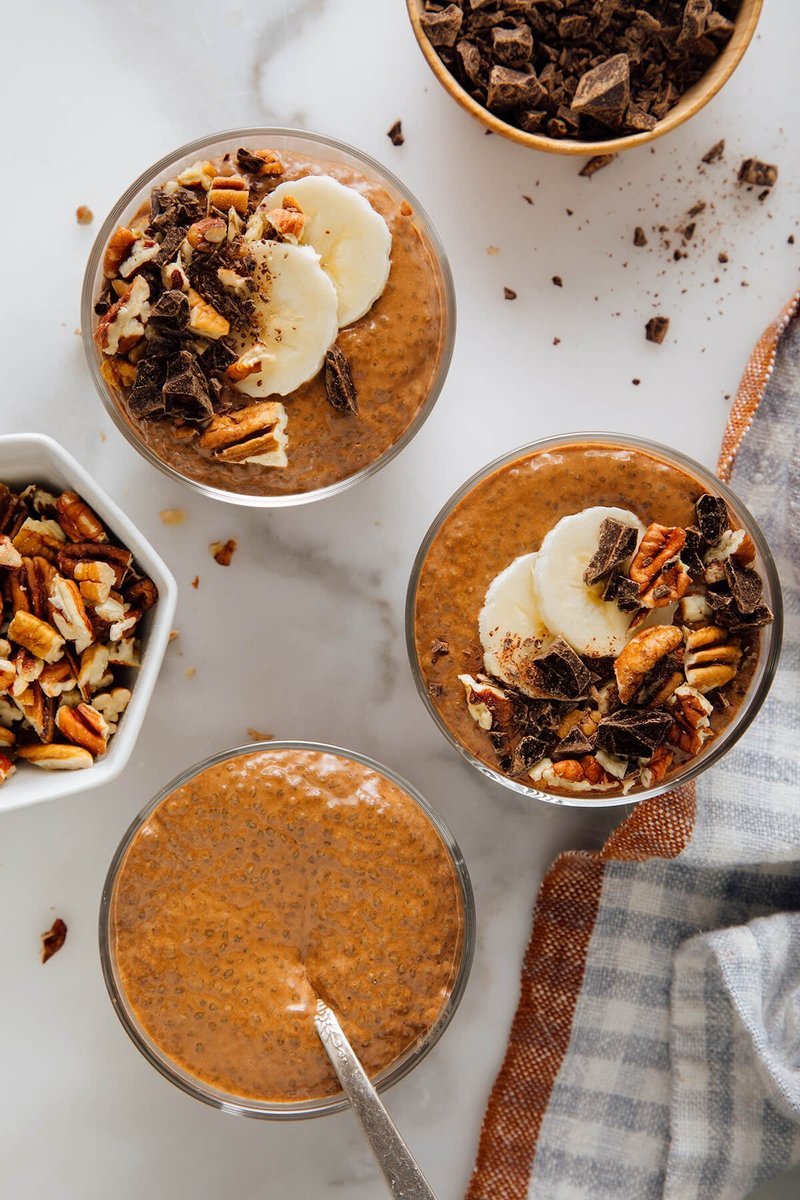 Chocolate chia pudding topped with nuts and chocolate